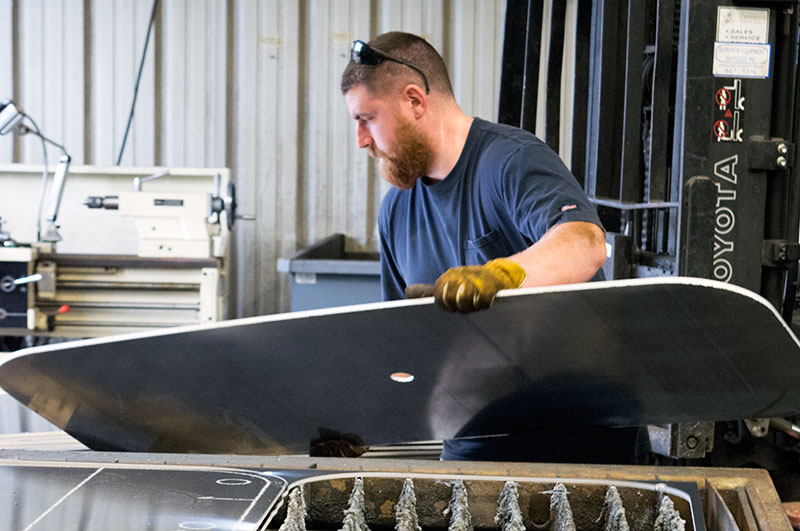 production manager Jared carefully picking up