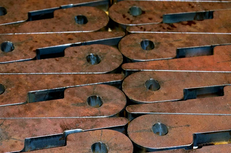 image og CNC cut pieces to diplay ability of repeating work and part consistency